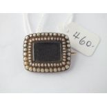 A 19thC square pearl mourning brooch