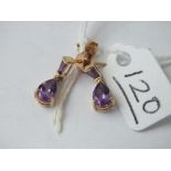 A pair of amethyst drop earrings in 9ct - 1.5gms