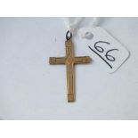 A fancy cross pendant in 9ct