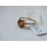 A citrine & diamond ring in 9ct - size N - 2.1gms
