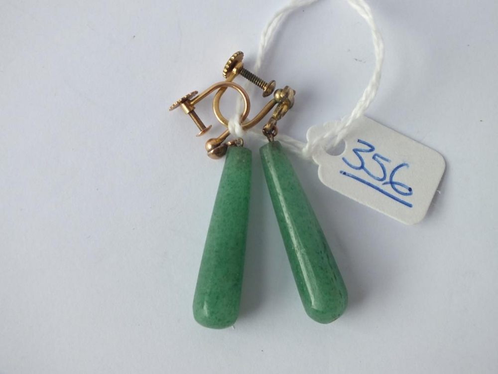 A pair of green hard stone drop earrings in 9ct