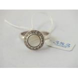 A silver moonstone ring - size V