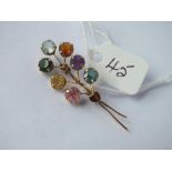 A gem set spray brooch