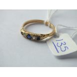 A diamond & sapphire 5 stone ring in 18ct gold - size P - 3.2gms