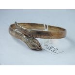 A silver gilt snake bracelet