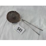 A basket shaped tea strainer