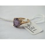 A amethyst dress ring set in 9ct - size J