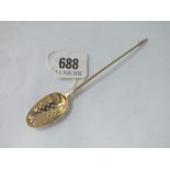 Georgian silver gilt moat spoon with engraved bowl