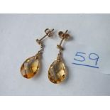 A pair of faceted citrine drop earrings