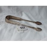 A early 19thC pair of Scottish provincial sugar tongs with shell bowls