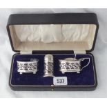 A boxed 3 piece cruet set with pierced sides with 3 BGL - B'ham 1925