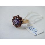 A large amethyst and garnet cluster ring - size M - 3gms