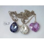 Three silver stone set pendant necklaces