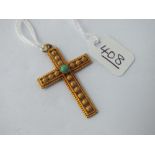 A turquoise stone cross pendant in 18ct gold - 4.4gms