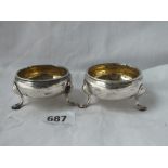 Pair of George III salts each on three pad feet - 1747 - 82gms