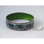 An enamelled bracelet with elephant motifs