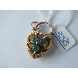 A 19thC heart padlock locket set with green stones (soldered) set in gold - 7.4gms