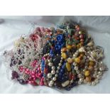 A large bag of assorted costume jewellery approx. 6kgs
