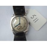 A silver vintage wrist watch with seconds sweep