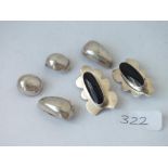 Three pairs of silver clip on earrings