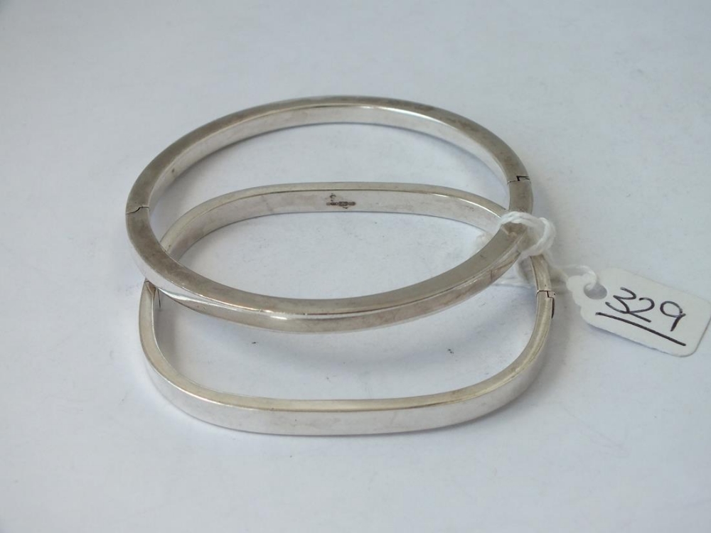 Two silver bangles