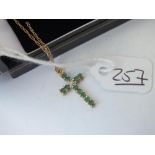 A emerald & diamond cross pendant in 9ct