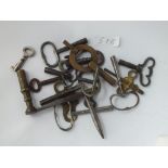 A bag of assorted watch & clock keys