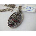 An attractive antique silver stone set pendant necklace depicting a vase of flowers
