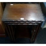 OLDER STYLE MAHOGANY NEST OF THREE TABLES WITH PIE CRUST EDGING