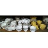 SHELF OF PART TEA SETS BY COLCLOUGH, ROYAL ALBERT BRIGADOON & DUCHESS & A YELLOW TEA SET