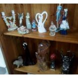 TWO SHELVES OF VARIOUS FIGURINES, STONE WARE & WOOD CARVINGS