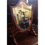 MAHOGANY SHIELD SHAPED SWING MIRROR