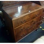 FLAME MAHOGANY CHEST OF TWO LONG & TWO SHORT DRAWERS WITH BRASS DROP HANDLES