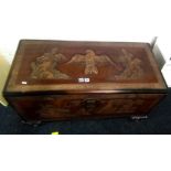 CARVED ORIENTAL TRUNK WITH BRASS HINGES