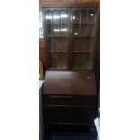 1930's OAK BUREAU BOOKCASE WITH BRASS DROP HANDLES GLASS FRONTED SHELVING