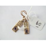 Pair of matching earrings in 9ct - 2.2gms