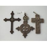 Three metal crosses including one filigree