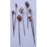 Seven assorted stick pins, six marked 15ct with one other