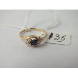 9ct ring with sapphire and white stones set on twist - size O - 1.75gms