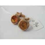 Pair of citrine set cufflinks in 9ct - 13.3gms