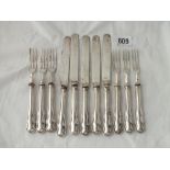 Eleven silver handled knives and forks