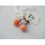 Pair of coral earrings set in 9ct