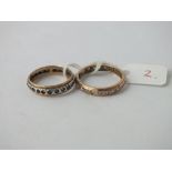 Two eternity rings in 9ct - sizes S and Q - 5.4gms