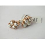 ATTRACTIVE PAIR OF GOLD AND FOUR-PEARL SET OF EARRINGS