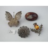 Silver butterfly brooch and three other silver brooches