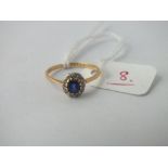 1930s oval sapphire and diamond cluster ring in 18ct gold and platinum - size J