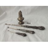 Three silver mounted button hooks and an 1899 pepper