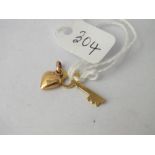 Heart and key charm in 9ct