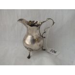 Georgian cream jug on three legs - 64gms