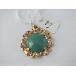 Circular jadeite pendant set in gold - 6.2gms